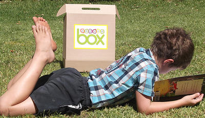 Child with Bookoo Box